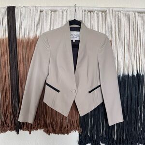 Cream Rachel Roy blazer with black trim; perfect condition